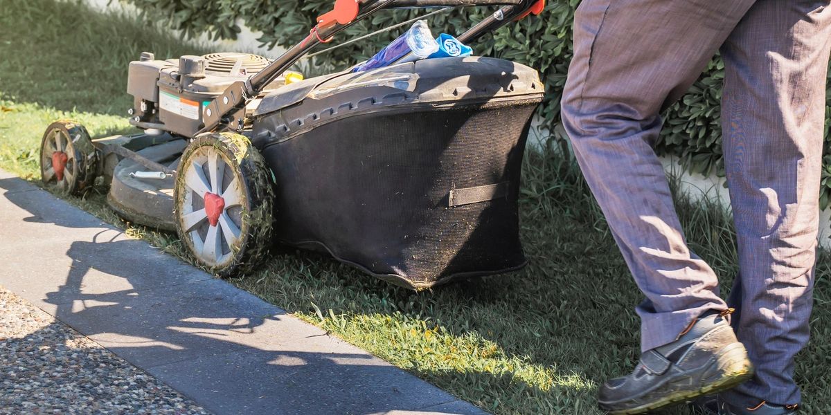 Professional landscaping crew lawn mowing residential